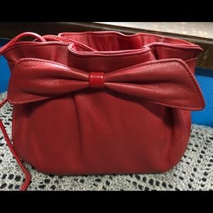 Cute red leather handbag with bow